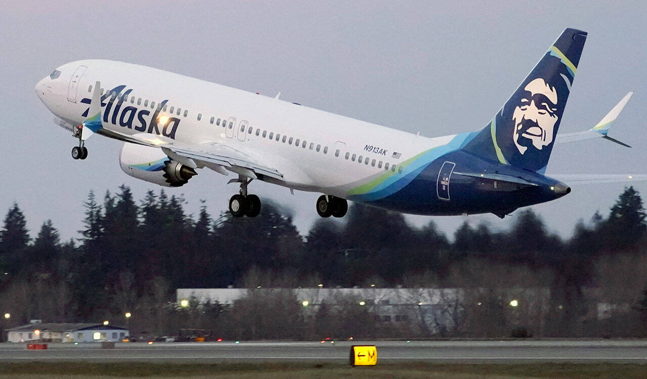 An Alaska Airlines Boeing 737-9 Max takes off from Seattle-Tacoma International Airport in Seattle. (AP Photo/Ted S. Warren, File)