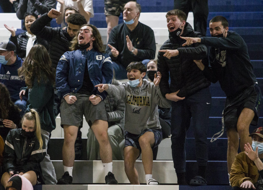 Glacier Peak fans react to a takedown during wrestling meet against Lake Stevens on Tuesday in Snohomish. (Olivia Vanni / The Herald)
