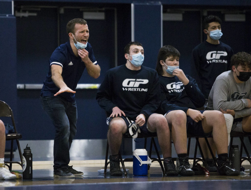 Glacier Peak’s John Edmonds yells instructions during a match against Lake Stevens on Tuesday in Snohomish. (Olivia Vanni / The Herald)
