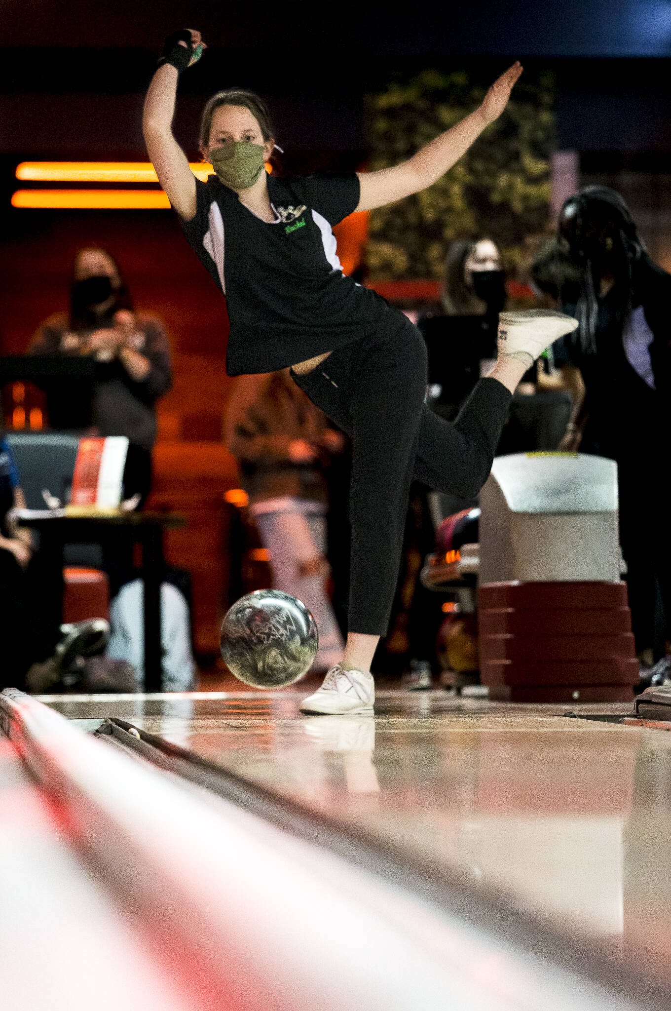 Jackson’s Rachel Andrzejenski bowls during a match against Everett on Wednesday in Lynnwood. (Olivia Vanni / The Herald)