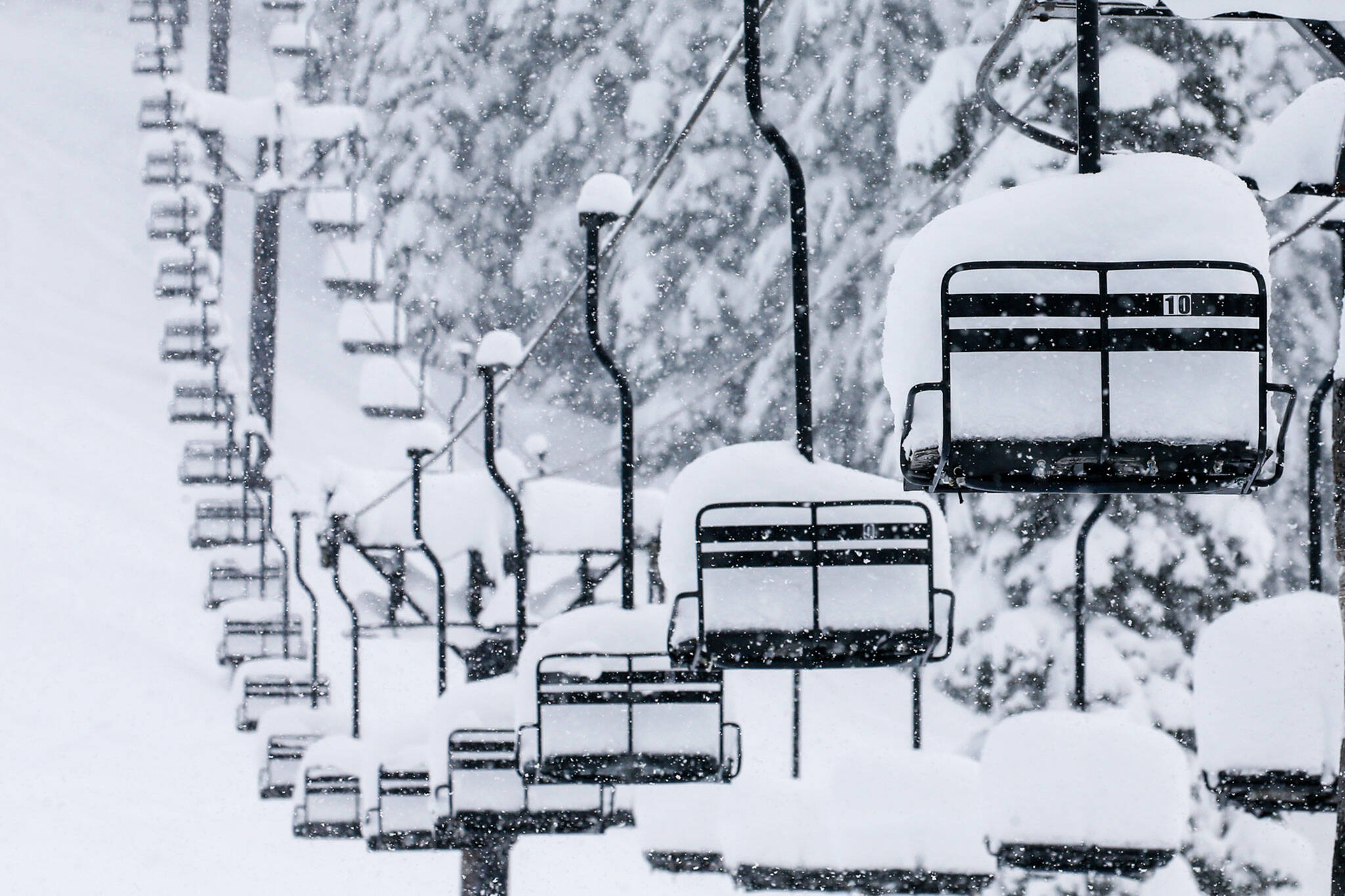 A chairlift sits idle at Stevens Pass on Dec. 30. (Kevin Clark / Herald file)