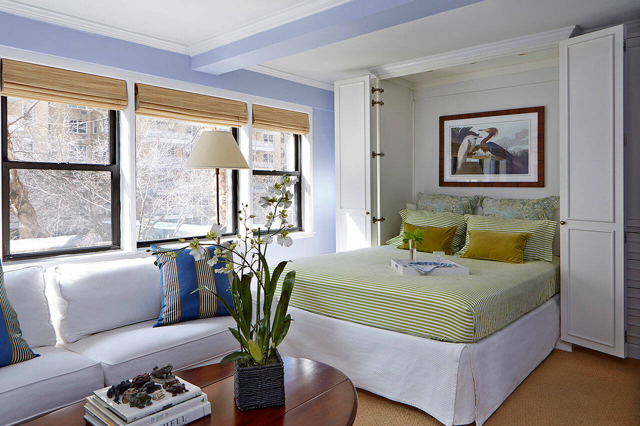 An open Murphy bed turns a living room into a bedroom in seconds. (Mentis Photography / Higgins Design Studio via Associated Press)
