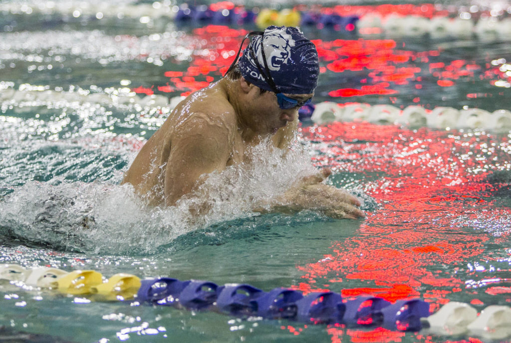 Glacier Peak’s Shouei Tong races in the 100-yard breastroke during a swim meet again Lake Stevens and Snohomish on Thursday in Snohomish. (Olivia Vanni / The Herald)
