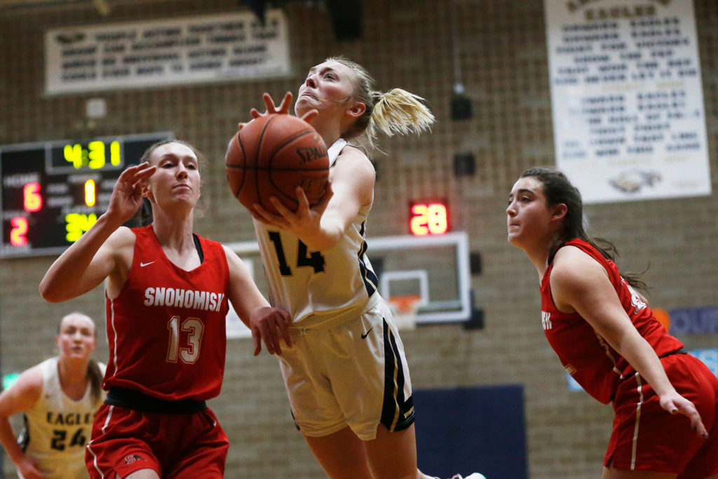 Keira Marsh and the Arlington girls have clinched the Wesco 3A/2A crown. (Ryan Berry / The Herald)
