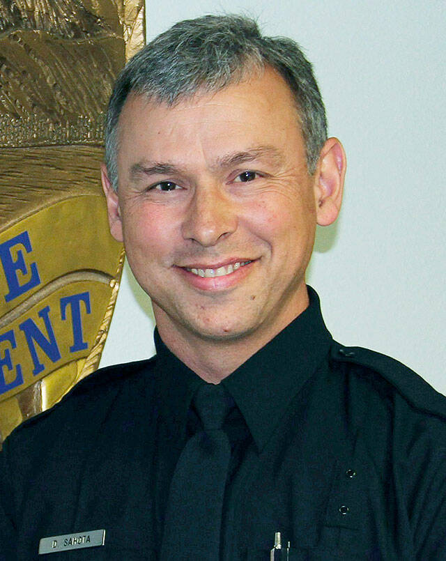Vancouver police officer Donald Sahota was killed while off-duty Saturday. A sheriff’s deputy who responded to a call about a robbery suspect at a Battle Ground home mistakenly shot and killed Sahota, the homeowner and an off-duty police officer who was trying to detain the man. (Vancouver Police Department via Associated Press)