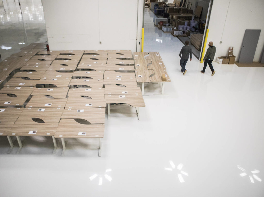 Office desks at the new Helion Energy headquarters in Everett. (Olivia Vanni / The Herald) 
