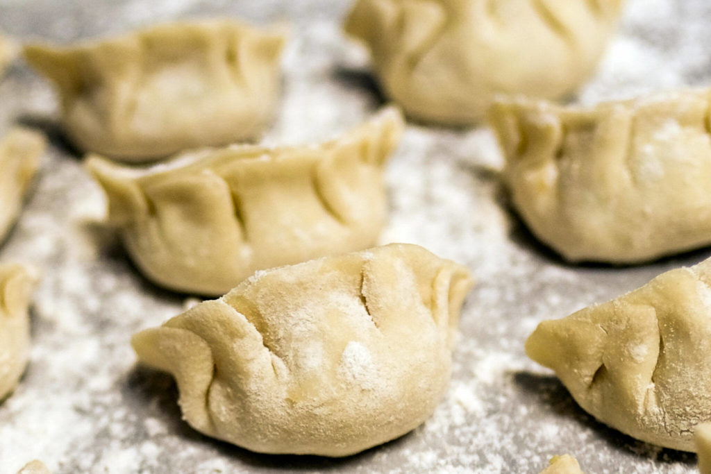 Pork dumplings are ready to be boiled at Bar Dojo in Edmonds on Monday. (Taylor Goebel / The Herald)

