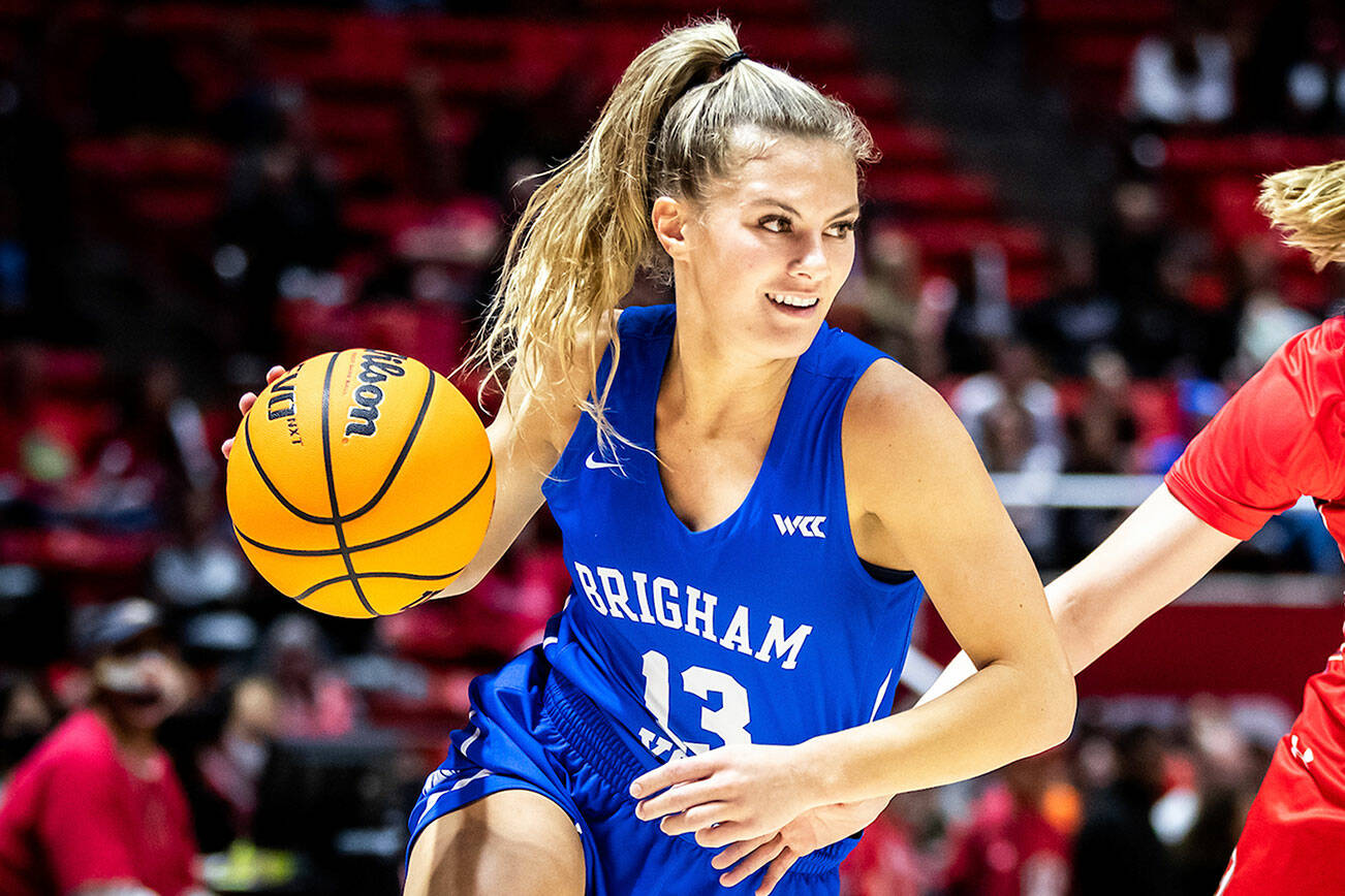 BYU's Paisley (Johnson) Harding drives with the ball during a game against Utah on Dec. 4, 2021, at Huntsman Center in Salt Lake City, Utah. Harding, a Glacier Peak graduate, was named the West Coast Conference Player of the Week for Jan. 24-30.  (BYU Photo)