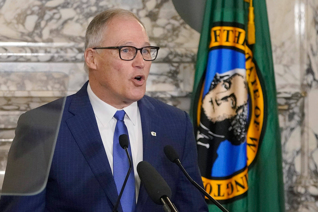 Gov. Jay Inslee gives his annual State of the State address, Jan. 11, at the Capitol in Olympia. Due to cautions against COVID-19, Inslee gave his speech in the State Reception Room and it was shown by streaming video to lawmakers meeting remotely. (Ted S. Warren / Associated Press)