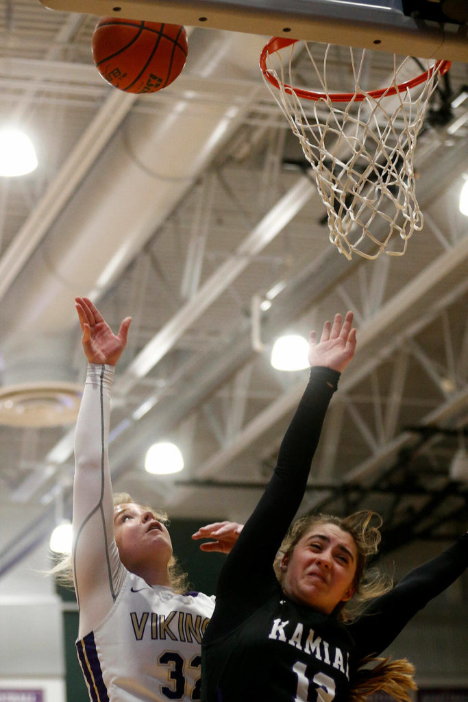 Lake Stevens’ Cori Wilcox hits a layup against Kamiak Monday, Feb. 7, 2022, at Lake Stevens High School in Lake Stevens, Washington. (Ryan Berry / The Herald)
