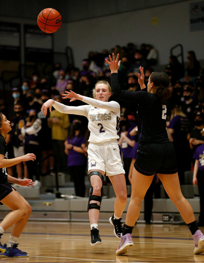 Lake Stevens’ Chloe Pattison records an assist against Kamiak Monday, Feb. 7, 2022, at Lake Stevens High School in Lake Stevens, Washington. (Ryan Berry / The Herald)
