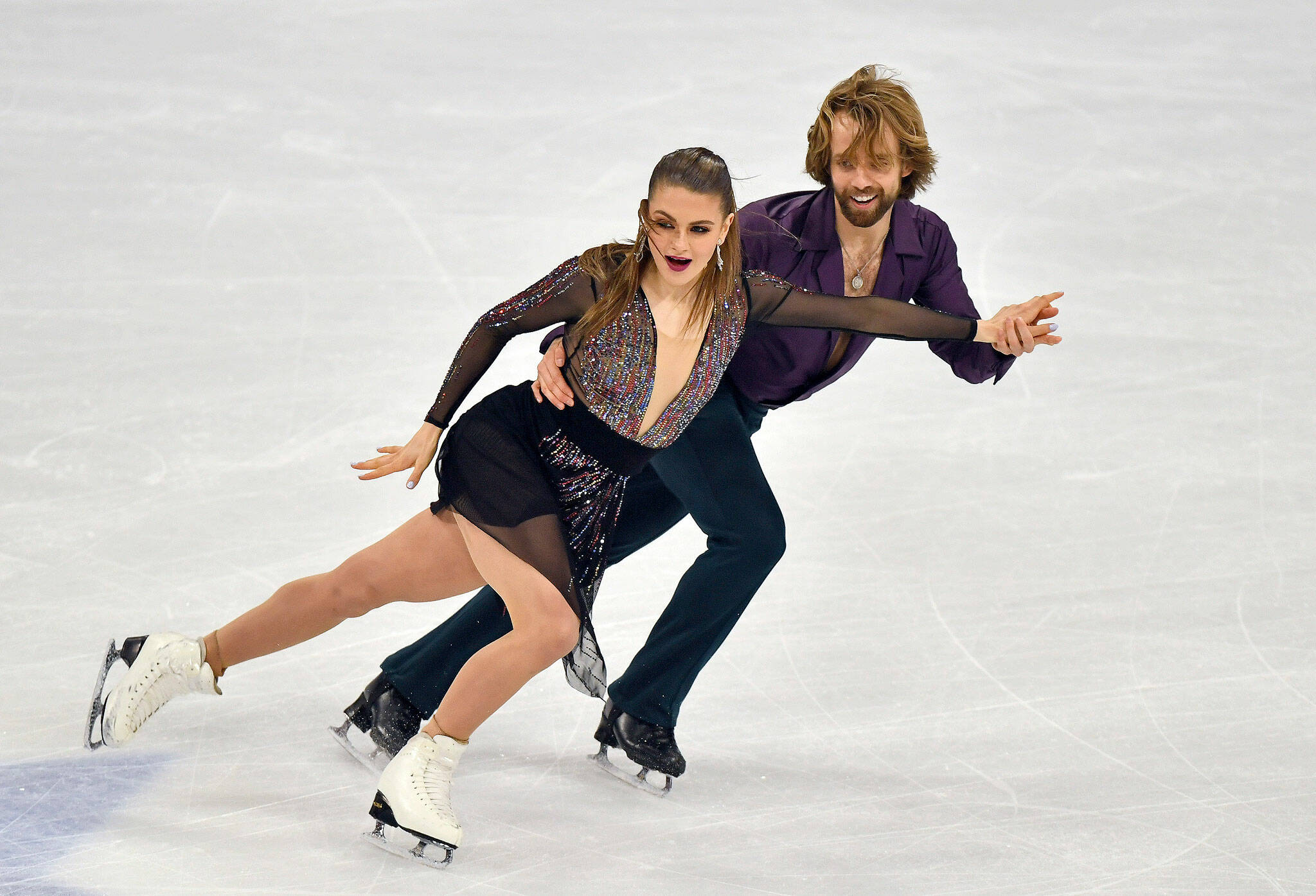 Jean-Luc Baker, a Kamiak High School alum, and his partner, Kaitlin Hawayek, perform during the Ice Dance-Rhythm Dance portion of the Figure Skating World Championships on March 26, 2021, in Stockholm, Sweden. (AP Photo/Martin Meissner)
