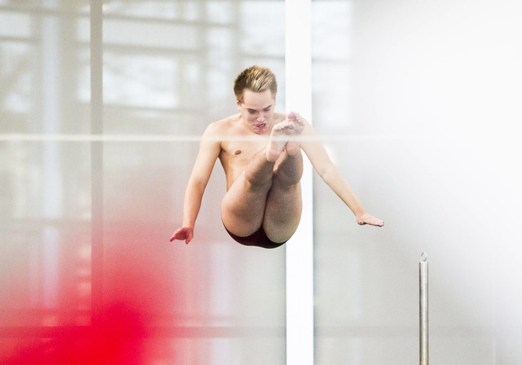 Lake StevensՠJaden Cardona dives during the 4A Boys Districts swim meet on Saturday, Feb. 12, 2022 in Snohomish, Wa. (Olivia Vanni / The Herald)
