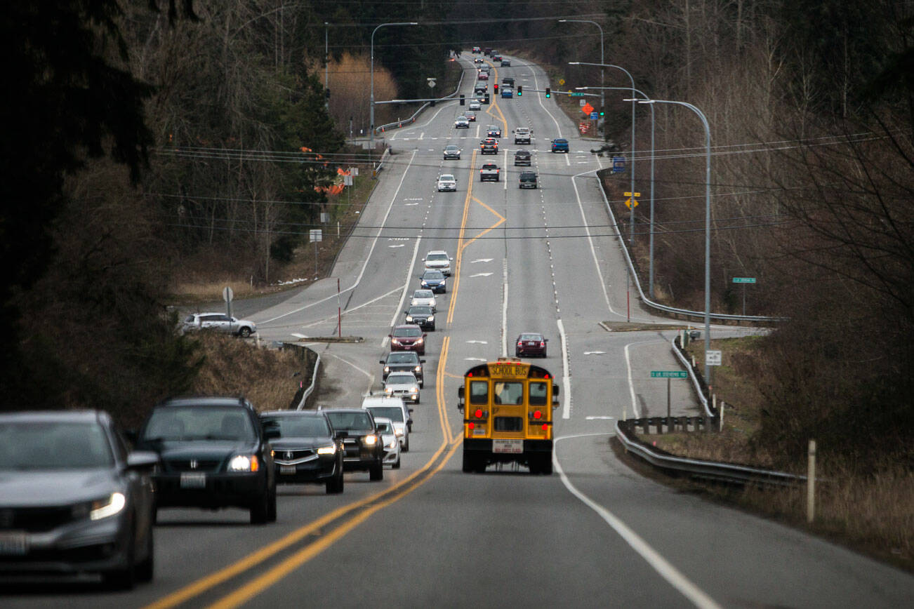 Cars drive through the intersection of Highway 9 and South Lake Stevens Road on Thursday, Feb. 17, 2022 in Lake Stevens, Washington. (Olivia Vanni / The Herald)