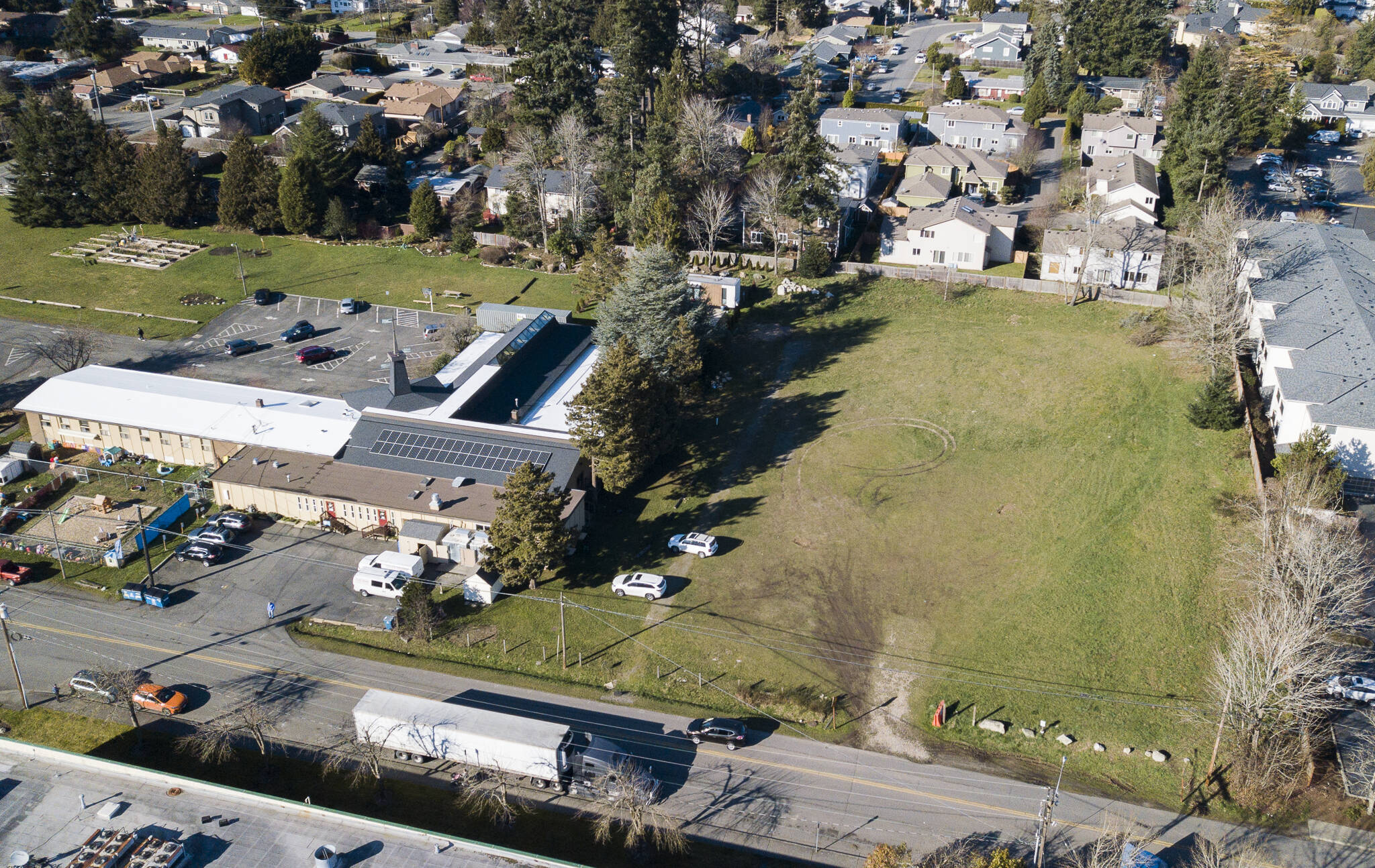The empty lot that Edmonds Lutheran Church recently sold to Housing Hope. Construction is expected to start next year. (Olivia Vanni / The Herald)