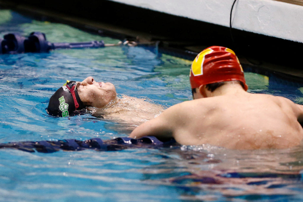 Alex Georgiev, of Jackson, reacts after coming up third in the 50 yard freestyle during the WIAA 4A Boys Swimming Championship on Saturday at the King County Aquatic Center in Federal Way. (Ryan Berry / The Herald)