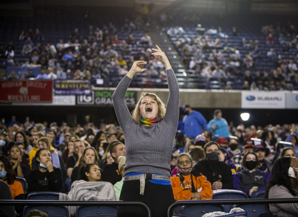 A Marysville Pilchuck fan cheers on Alivia White during the Mat Classic XXXIII on Saturday in Tacoma. (Olivia Vanni / The Herald)
