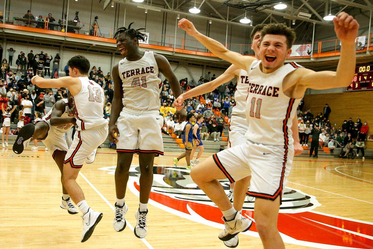 Mountlake Terrace celebrates winning the 3A District Title over Ferndale Saturday evening at Everett Community College in Everett, Washington on February 19, 2022. (Kevin Clark / The Herald )