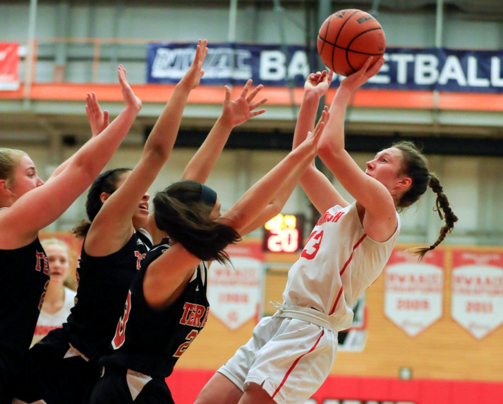 Ella Gallatin (right) leads Snohomish with 21 points per game. (Kevin Clark / The Herald )
