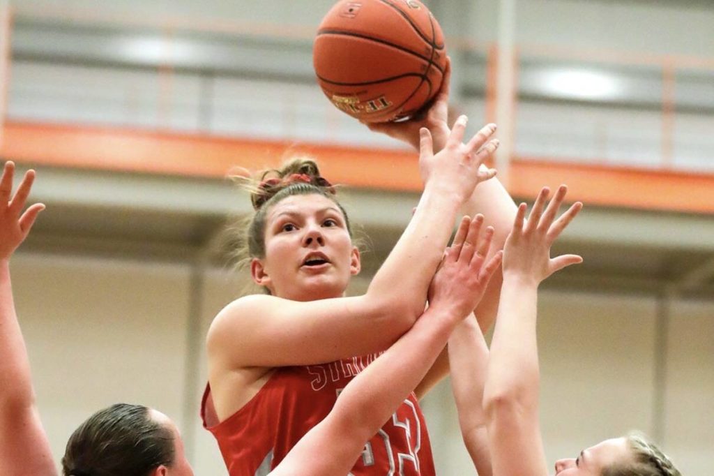 Vivienne Berrett and Stanwood are coming off a district runner-up finish. (Kevin Clark / The Herald )
