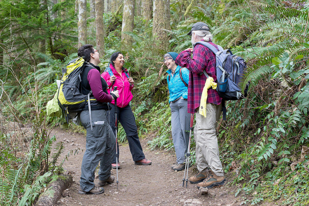 Hikers pause to chat on the trail to Rattlesnake Ledge off I-90 east of Issaquah. (Erika Haugen-Goodman)
