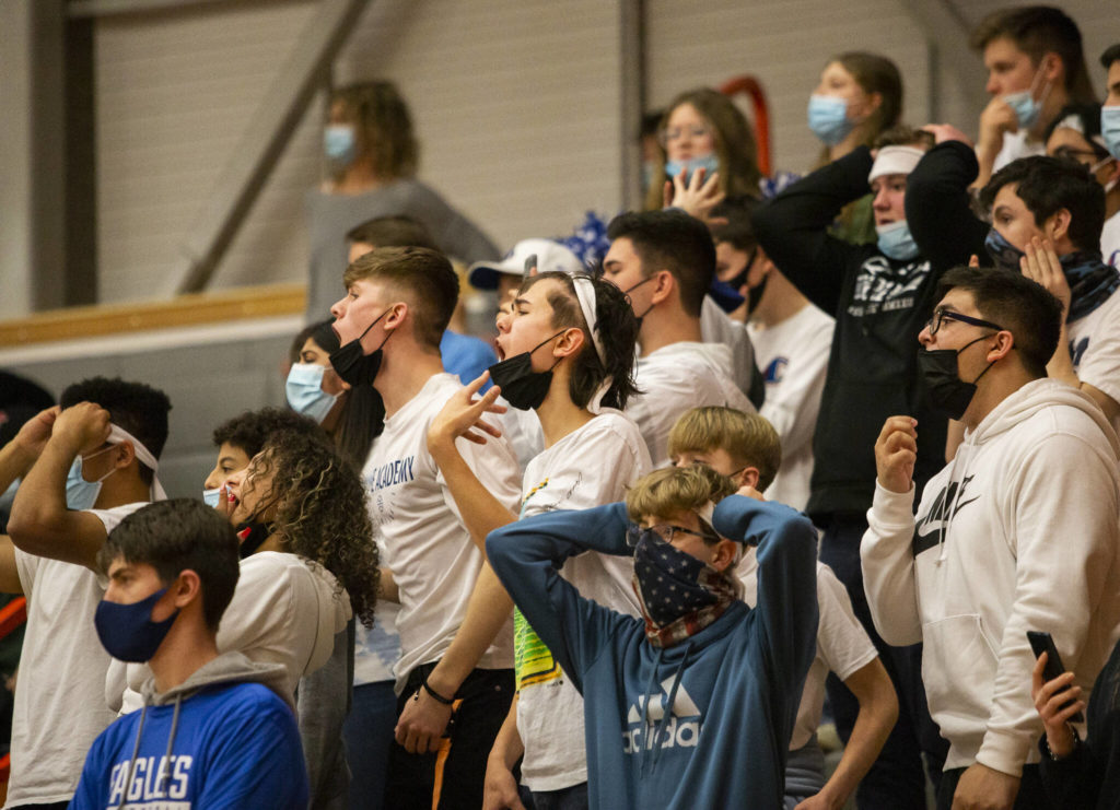 Grace Academy fans react to a stolen ball during the game against Cusick on Friday, Feb. 25, 2022 in Everett, Washington. (Olivia Vanni / The Herald)
