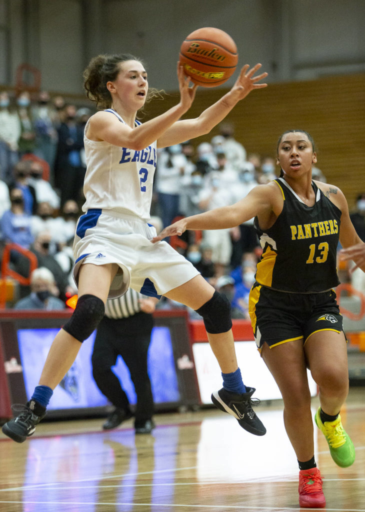 Grace Academy’s Zia Fackenthal jumps while making a pass during the game against Cusick on Friday, Feb. 25, 2022 in Everett, Washington. (Olivia Vanni / The Herald)
