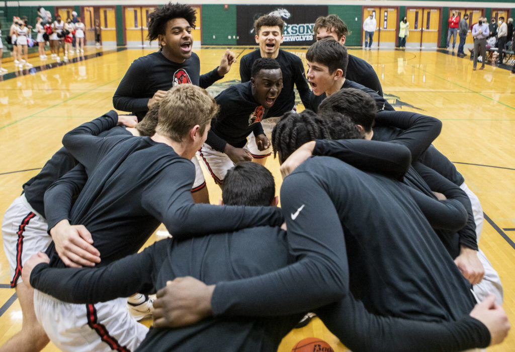 Mountlake Terrace players get pumped up before the start of the game against Kelso on Saturday, Feb. 26, 2022 in Mill Creek, Washington. (Olivia Vanni / The Herald)
