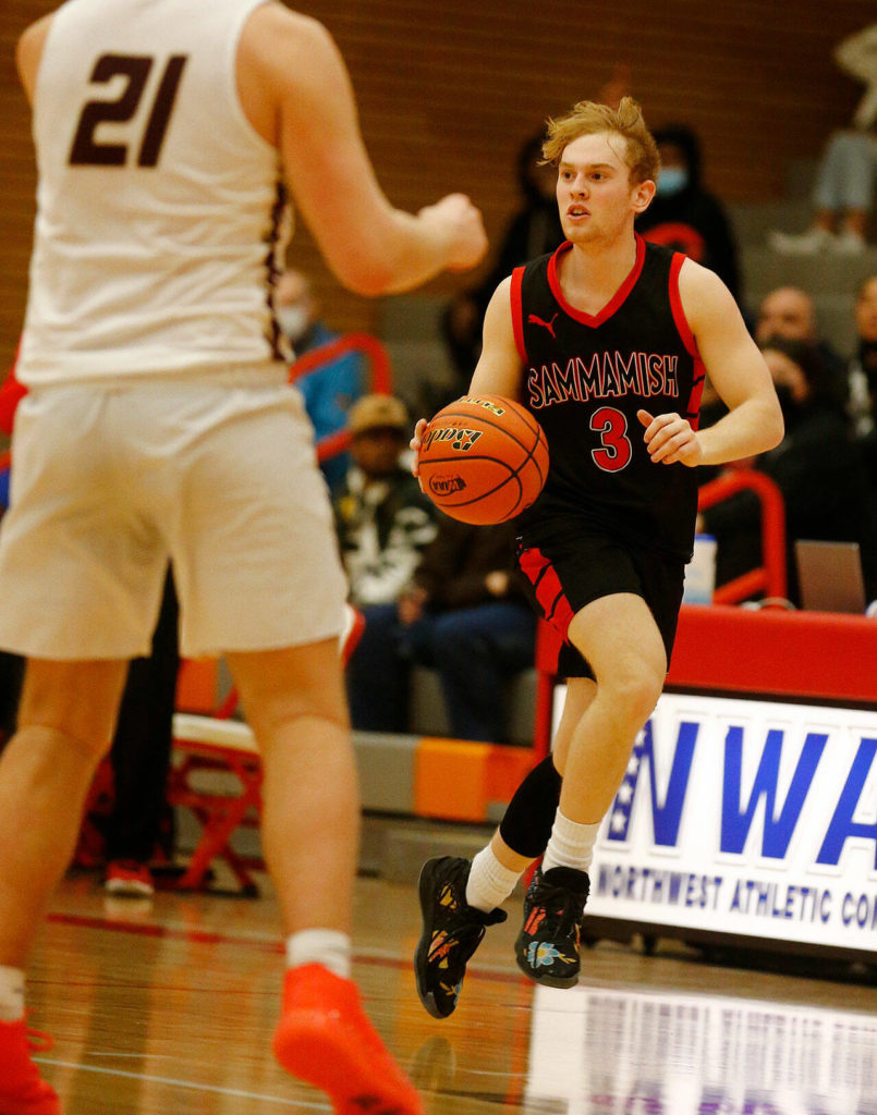 Sammamish’s Nate Alessi looks to set up a play against Lakewood Saturday, Feb. 26, 2022, during a Class 2A regional matchup at Everett Community College in Everett, Washington. (Ryan Berry / The Herald)
