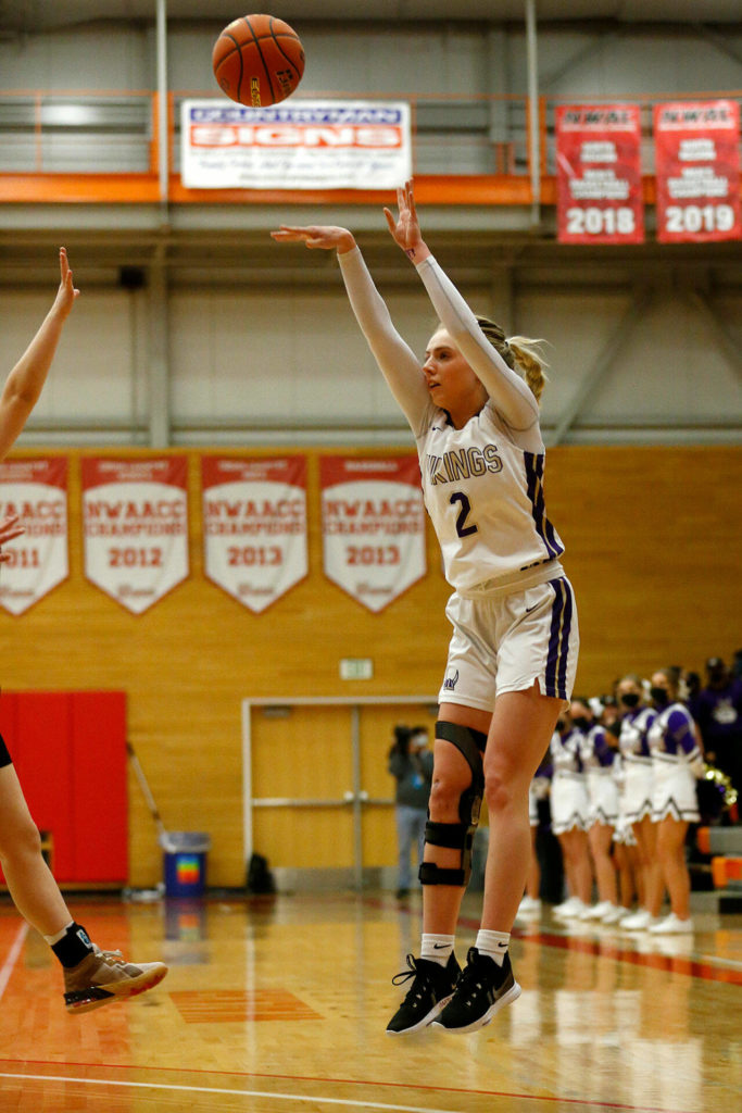 Lake Stevens’ Chloe Pattison shoots a jumper against Eastlake Saturday, Feb. 26, 2022, during a Class 4A regional matchup at Everett Community College in Everett, Washington. (Ryan Berry / The Herald)
