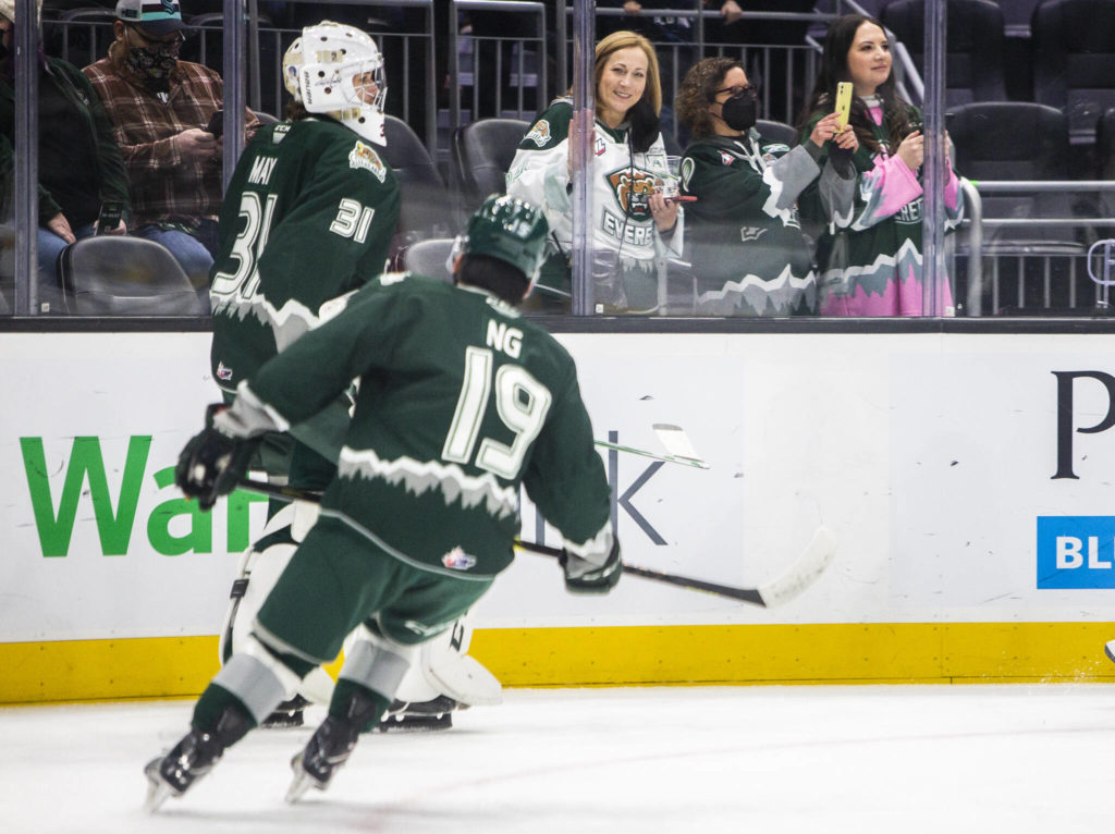 Everett Silvertips fans watch the team warmup before the start of the game against the Seattle Thunderbirds at Climate Pledge Arena on Saturday, Feb. 26, 2022 in Seattle, Washington. (Olivia Vanni / The Herald)
