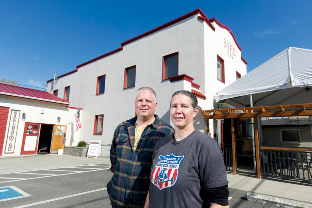 Owners Matt Stromberg and Kristine Birkenkopf opened SAAL Brewing Co. in Stanwood’s former fire hall. (Andy Bronson / The Herald)
