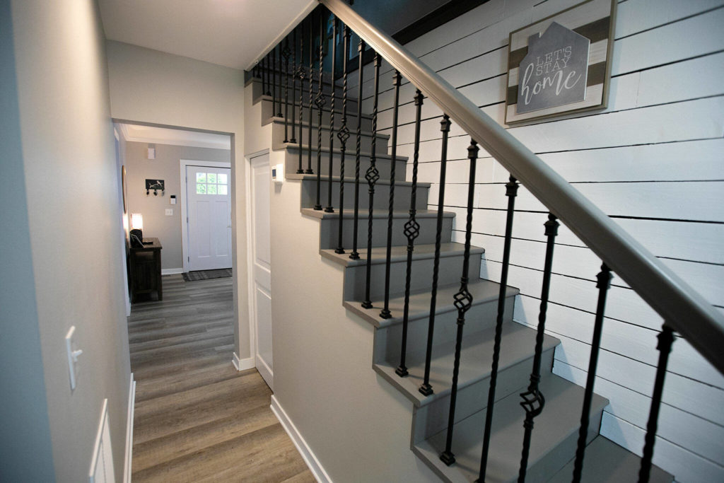 A fresh coat of paint colors the area around the staircase. (Ryan Berry / The Herald)
