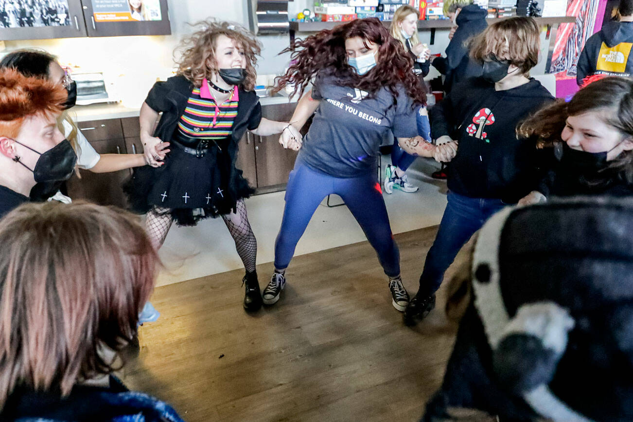 Members of PRISM close out a dance off Friday afternoon at the Stanwood-Camano YMCA in Stanwood, Washington on March 3, 2022. (Kevin Clark / The Herald)