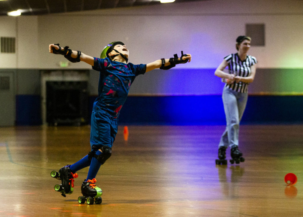 Dylan Norsby, 9, reacts to winning the final race of the night at the Everett Skate Deck. (Olivia Vanni / The Herald)
