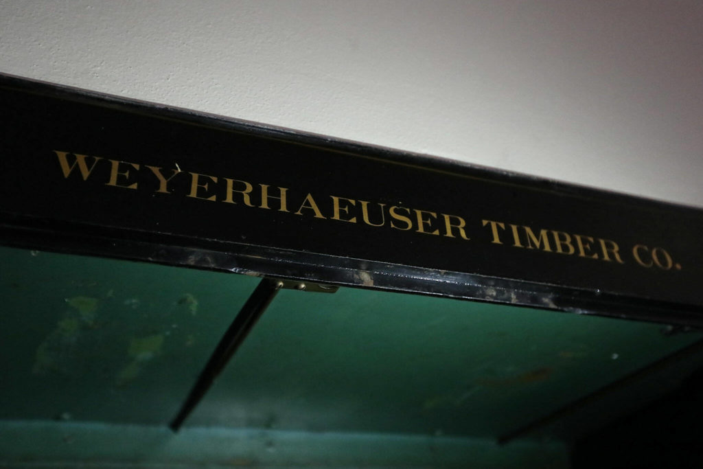 Old text labels the safe of the Weyerhaeuser Building at the Port of Everett. (Ryan Berry / The Herald) 
