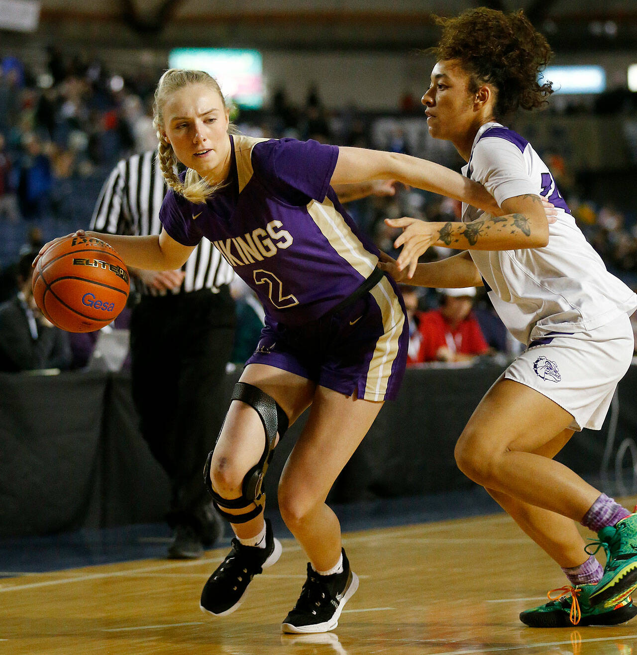 Lake Stevens’ Chloe Pattison dribbles to the baseline during a 4A state quarterfinal game against Pasco on Thursday at the Tacoma Dome. (Ryan Berry / The Herald)