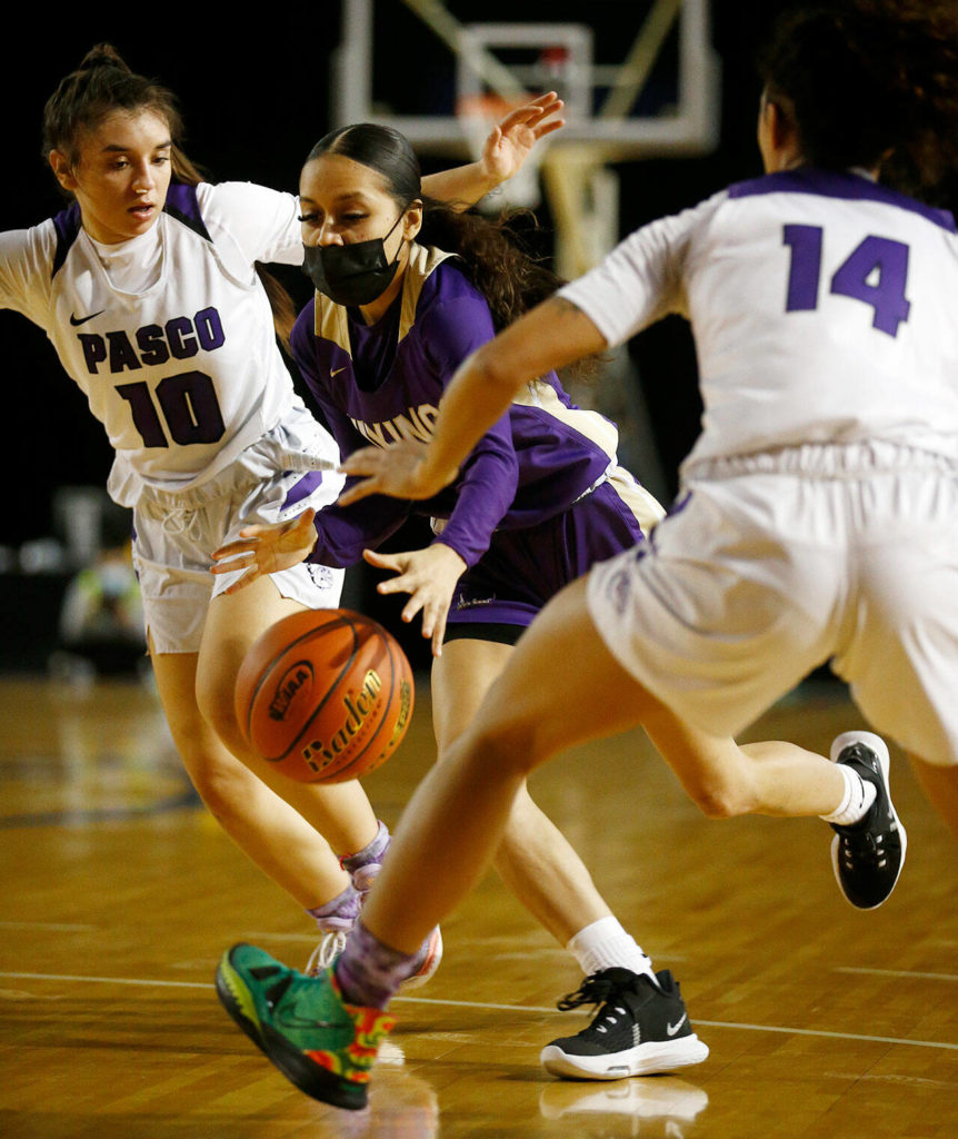 Lake Stevens’ Perla Ruiz drives to the paint against Pasco on Thursday at the Tacoma Dome. (Ryan Berry / The Herald)
