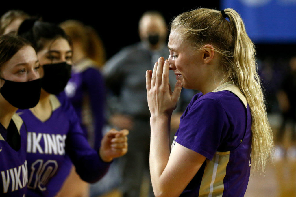 Lake Stevens’ Chloe Pattison tears up after failing to get off a last-second shot to tie the game against Pasco Thursday, March 3, 2022, during a 4A matchup at the Tacoma Dome in Tacoma, Washington. (Ryan Berry / The Herald)
