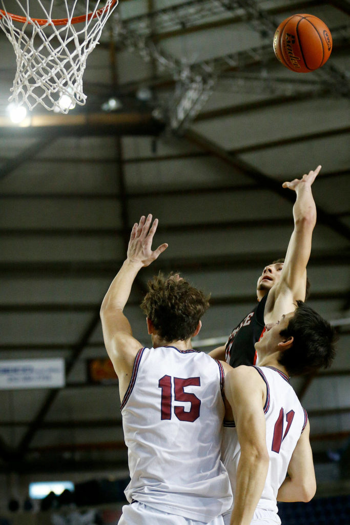 Mountlake Terrace’s Chris Meegan tries the floater against Mt. Spokane on Thursday at the Tacoma Dome. (Ryan Berry / The Herald)
