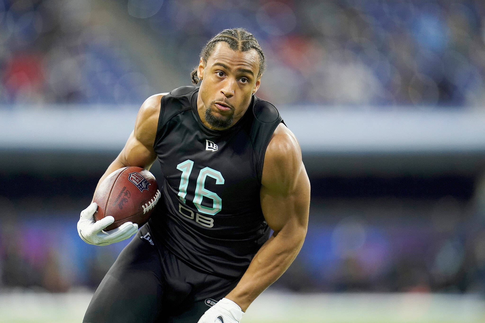 Washington defensive back Kyler Gordon, an Archbishop Murphy alum, participates in a defensive back drill at the NFL scouting combine on Saturday in Indianapolis. (AP Photo/Steve Luciano)