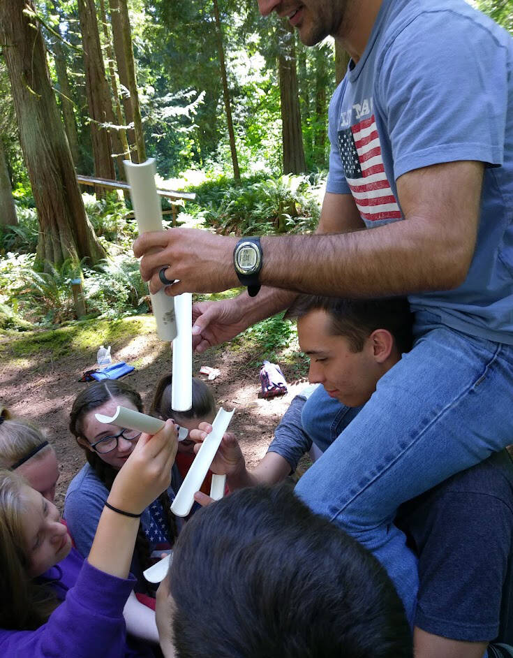 Participants in a Facilitating Team Solutions class learn team-building, conflict resolution and other skills with the guidance of Donna Lowe and John Grebe.