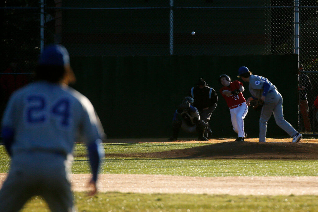 Archbishop Murphy’s Grant Locke flies out to the center fielder during a jamboree game against Seattle Prep Wednesday, March 9, 2022, in Everett, Washington. (Ryan Berry / The Herald)
