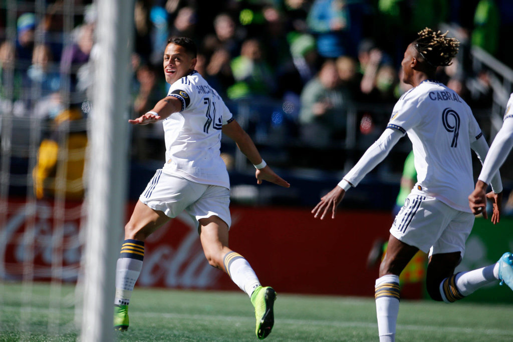 The Los Angeles Galaxy’s Chicharito celebrates an early goal against the Sounders Saturday, March 12, 2022, at Lumen Field in Seattle, Washington. (Ryan Berry / The Herald)

