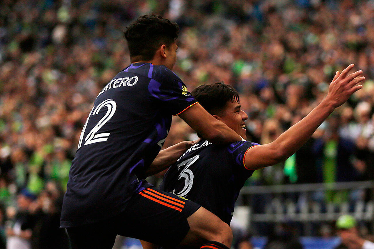 The Seattle Sounders’ Xavier Arreaga celebrates a goal against the Los Angeles Galaxy Saturday, March 12, 2022, at Lumen Field in Seattle, Washington. (Ryan Berry / The Herald)