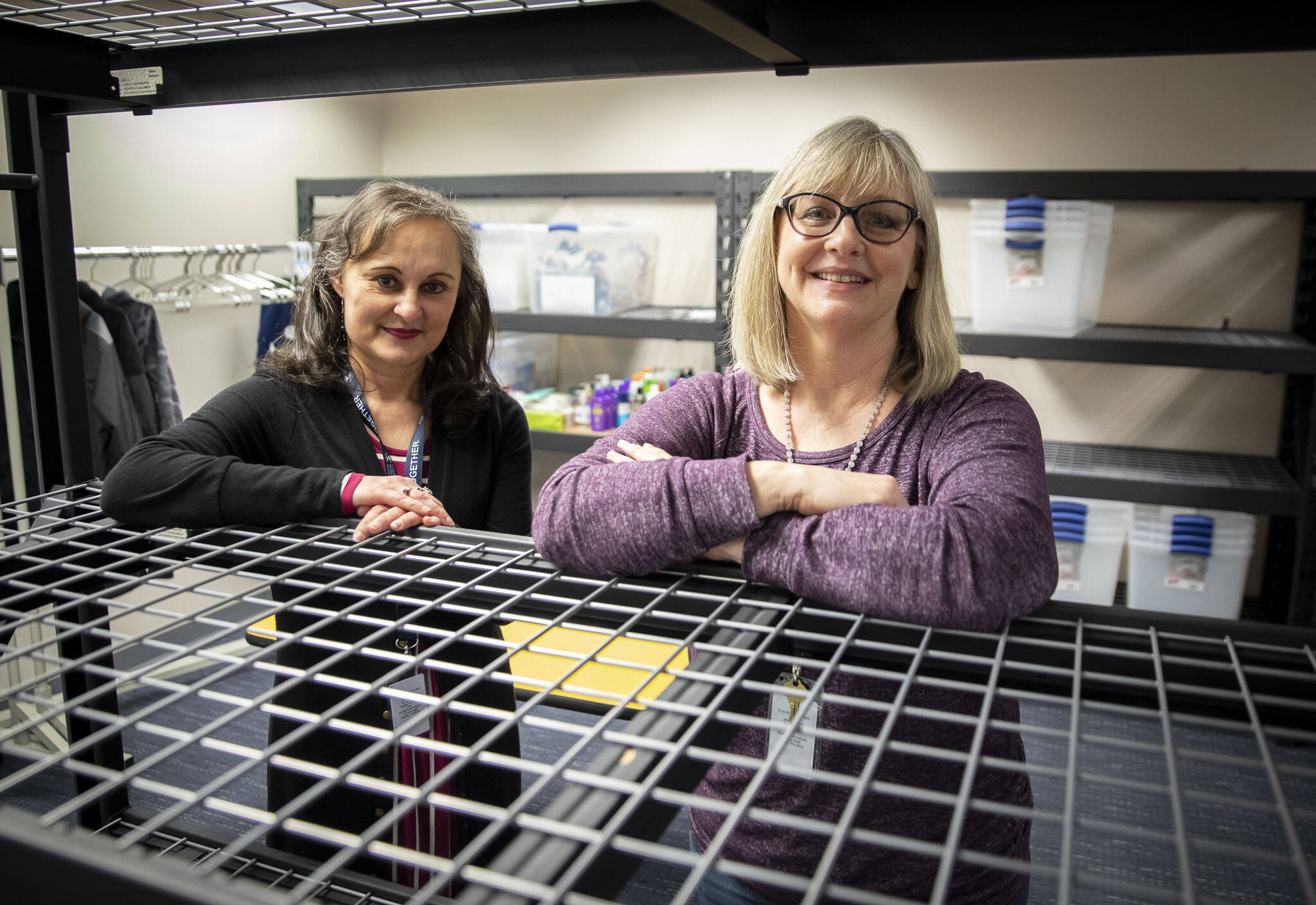 Family Resource Center support assistant Conchita Chinchilla (left) and resource coordinator Lyn Lauzon ( right) at the new Family Resource Center in Hawthorne Elementary on Friday in Everett. (Olivia Vanni / The Herald)