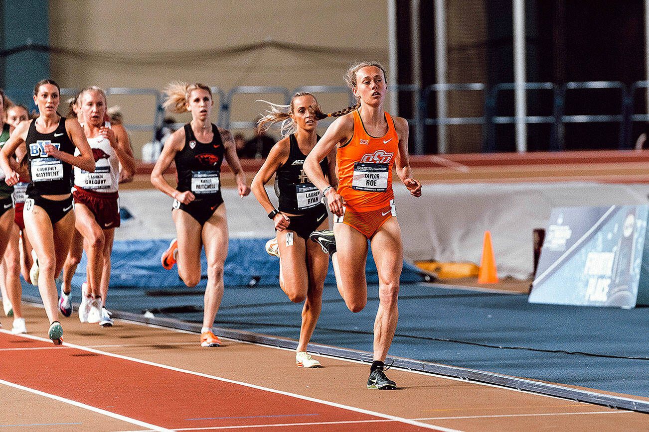 Oklahoma State's Taylor Roe, a Lake Stevens High School graduate, paces the field on her way to winning the indoor women's 3,000 meter Division I national championship on March 12, 2022, in Birmingham, Alabama. (OSU Athletics)