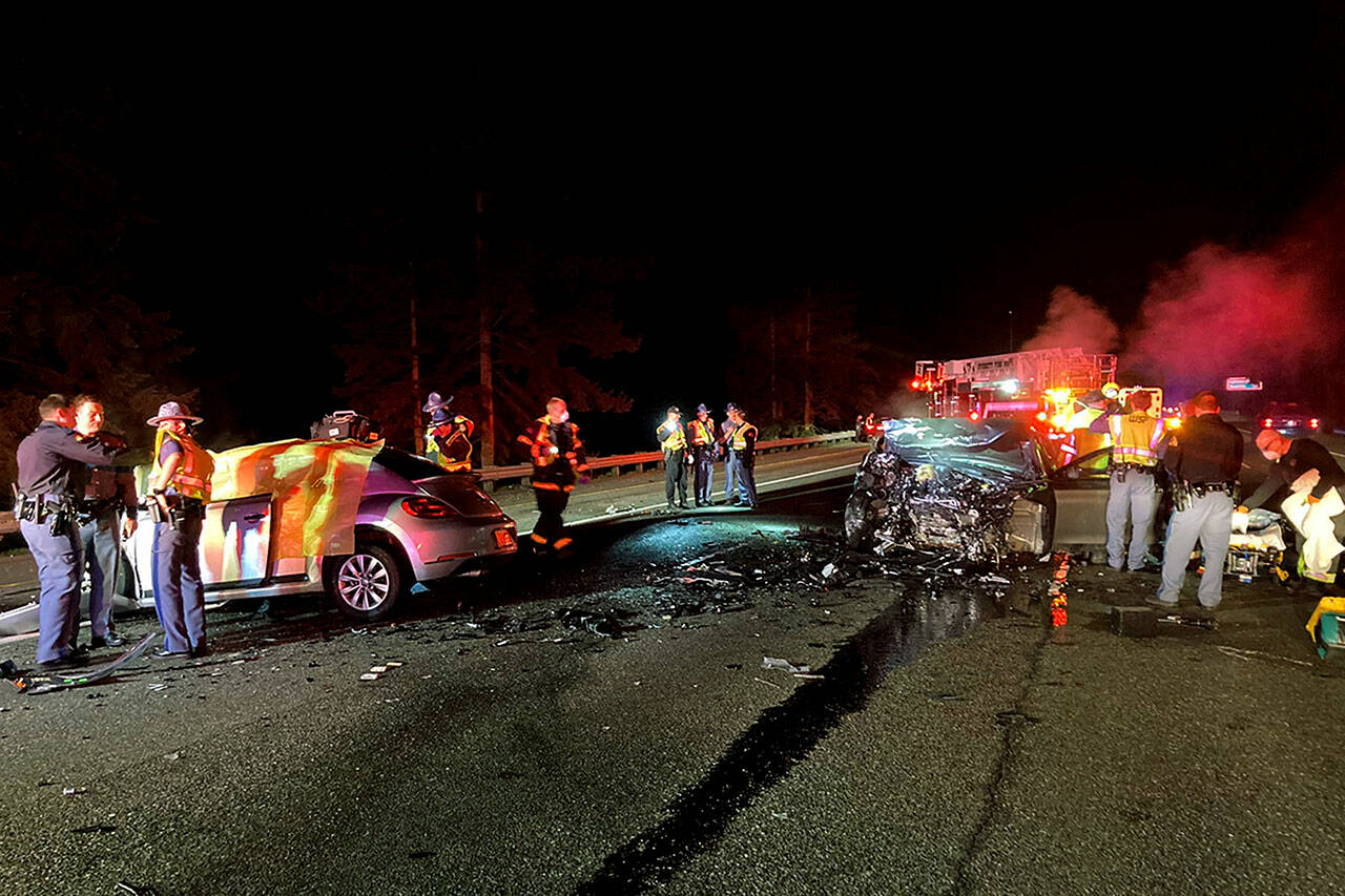 The scene of a two-car collision on southbound I-5 in Everett, just south of 41st Street, early on Feb. 19. (Washington State Patrol)