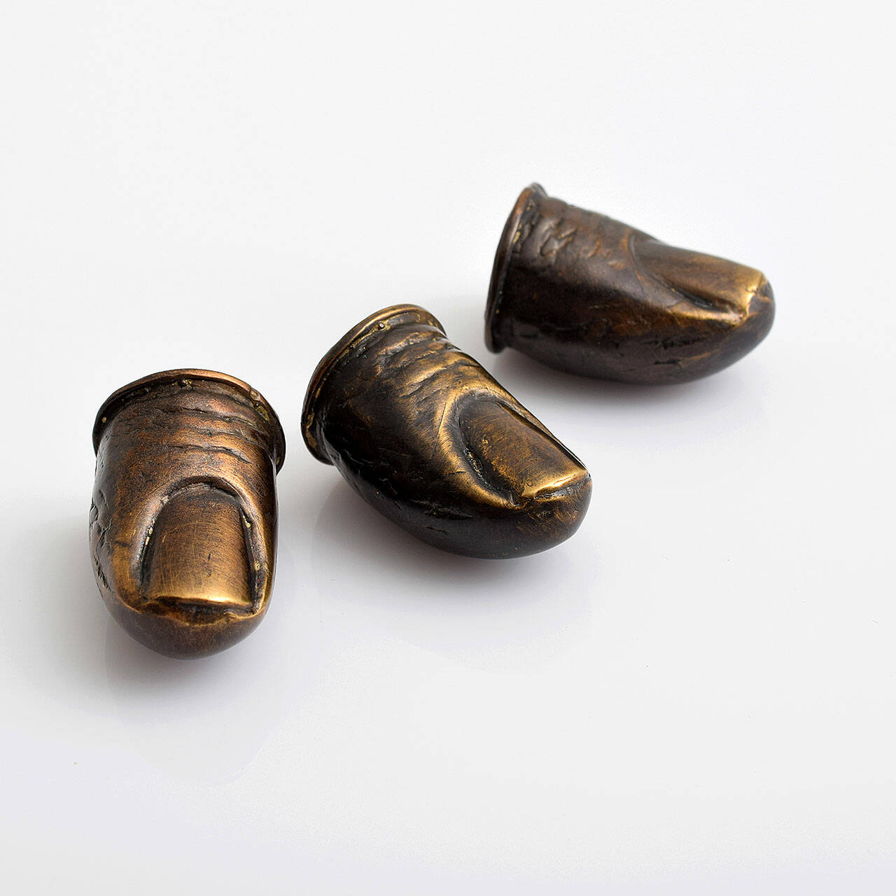 This set of three copper fingers sold for $3,770 at a recent Palm Beach auction.
