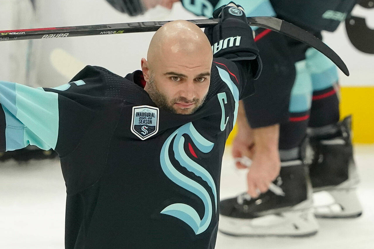 Defenseman Mark Giordano holds his stick during warmups before the Seattle Kraken’s game against the Tampa Bay Lightning on March 16 in Seattle. (AP Photo/Ted S. Warren)